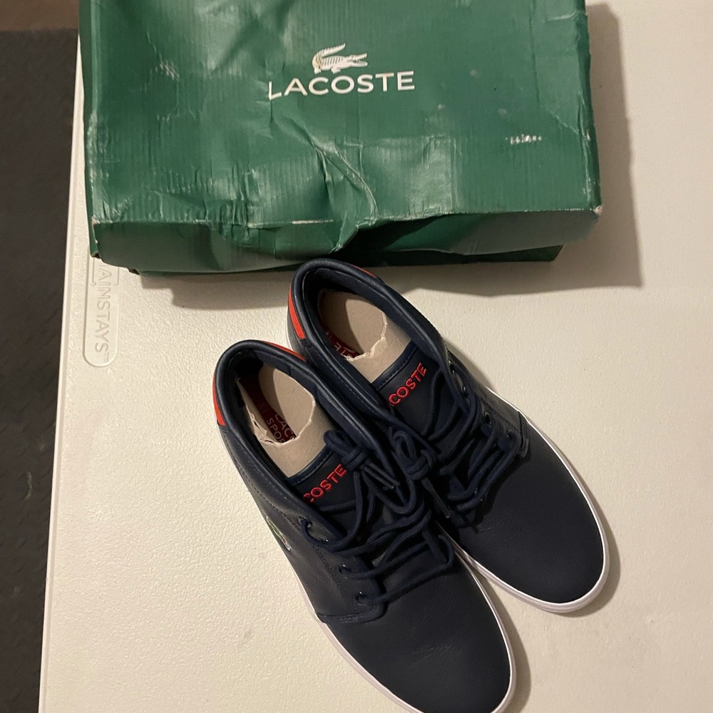 Men’s brand new Lacosse mid’s size 10 leather